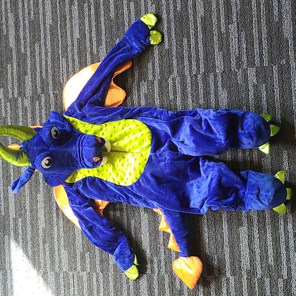 Halloween costume. Blue little dragon.